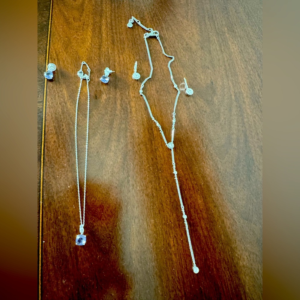 DKNY Silver Costume Jewelry set and Silver Costume jewelry  with a purple stone.